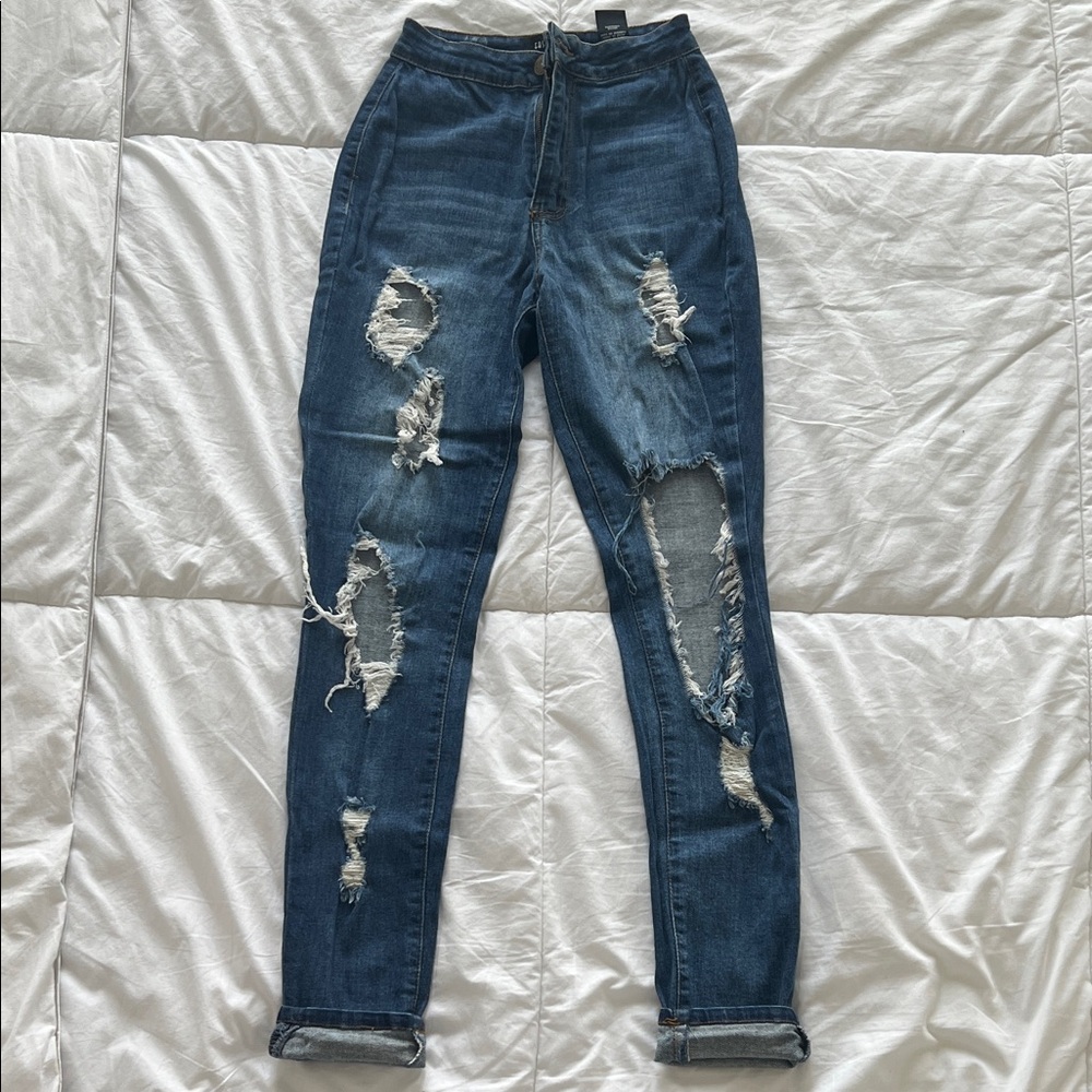 High-waisted Distressed Skinny Jeans
